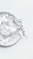 Clear gel or serum droplet with water bubbles on white background, isolated cosmetic product for skincare, beauty, and dermatology design use.