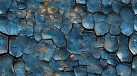 Weathered blue paint peeling and cracking on old surface creates abstract pattern with deep texture and aged patina showing rust and decay beneath surface layers.