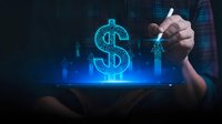 Businessman hand touching holographic dollar sign symbol on tablet screen representing digital finance technology and investment growth concepts.