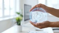 Hands protecting glowing recycling symbol sphere in modern office environment representing environmental sustainability and eco-friendly business practices.