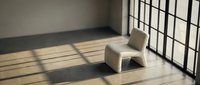 A minimalist interior space featuring a single beige sculptural seat positioned on light wooden flooring, illuminated by natural sunlight casting geometric shadows through gridded windows, suitable for modern design and architectural visualization.