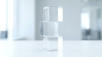 Clear glass cosmetic bottle with pump dispenser on white surface in bright modern interior for skincare and beauty product packaging.