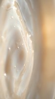 Delicate translucent fabric with sparkling water droplets creates ethereal texture in soft golden light for luxury fashion and beauty concepts.