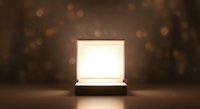 Glowing laptop computer with blank screen on dark background with bokeh lights, suitable for technology and business presentations.