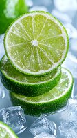 Fresh lime slices stacked with ice cubes on cool blue background, macro shot showing juicy citrus texture and water drops for cocktail and beverage concepts.