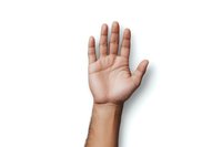 Open palm of light-skinned person with arm showing against white background, isolated cutout for design projects and commercial use.