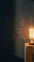 Vintage Edison bulb on wooden stand illuminating medical science symbols on textured wall creating warm atmospheric lighting for research concepts.