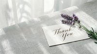 Elegant thank you card with lavender flowers on a linen surface, soft natural light, minimalist style for wedding or greeting design.