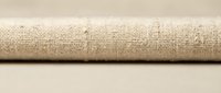 Natural burlap fabric roll texture background for rustic crafts, sewing projects, and eco-friendly packaging design applications.