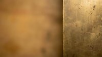 Golden bronze metal texture backgrounds with weathered patina and smooth gradient surfaces for luxury design projects and vintage aesthetic applications.