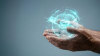 Mature male hand holding glowing digital globe with network connections, representing global technology, data transfer, and worldwide communication for business and innovation concepts.