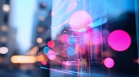 Futuristic urban cityscape with vibrant pink and blue bokeh lights creating abstract digital network visualization against blurred skyscraper background.