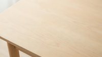 Wooden table with natural light grain texture and smooth surface, suitable for interior design, furniture photography, and home decor projects.