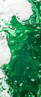 Swirling emerald green liquid with white marbling effect and bubbles creates dynamic abstract pattern on light background, suitable for modern design projects.