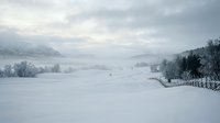 Serene winter landscape with snow-covered frozen lake, distant mountains, and evergreen forest under cloudy sky. Peaceful nature scene.