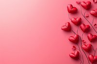 Red origami paper hearts arranged as flowers with stems on pink background, perfect for Valentine's Day or romantic designs.