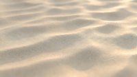 Soft golden sand dunes with gentle ripples and waves created by wind, natural desert texture background for travel and nature concepts.