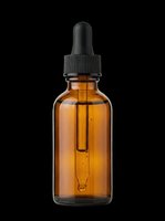 Amber glass dropper bottle with black cap isolated on transparent background, ready for cosmetic, essential oil, serum, and supplement product design use.