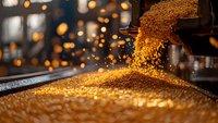 Golden corn kernels pouring from industrial machinery with sparkling particles in dramatic lighting, showcasing agricultural processing and grain production.