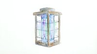 Rustic wooden lantern with blue and green stained glass panels, isolated on white background, suitable for home decor, design projects and interior styling.