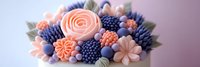 Elegant soap flowers bouquet with coral roses and purple blooms on soft pink background for spa wellness beauty skincare natural cosmetics relaxation.