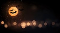 Flying bats silhouettes against bright full moon in dark night sky with bokeh lights and magical sparkles creating spooky Halloween atmosphere.
