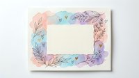 Watercolor floral frame with delicate botanical elements and soft pastel colors, empty space for text or design elements on white background.
