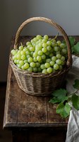 Fresh green grapes overflowing in woven basket on rustic wooden table with vine leaves. Harvest produce for farmers market, food styling, culinary content.
