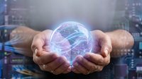 Businessman holding glowing digital globe with network connections, representing global communication, technology innovation, and worldwide business connectivity for corporate solutions.