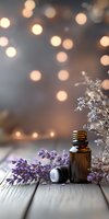Essential oil amber bottle with fresh lavender flowers on rustic wooden surface against soft bokeh lights background, creating calming spa atmosphere.