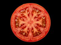 Fresh tomato slice isolated on transparent background, ready for culinary design, recipe graphics, food packaging, print-on-demand products, and digital cooking content.