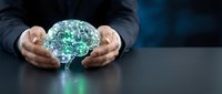 Businessman in suit protecting glowing digital brain with circuit patterns representing artificial intelligence, machine learning and neural networks in technology.