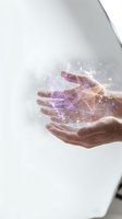 Hands holding glowing digital network with purple and gold geometric connections, representing data transfer, technology innovation, and digital transformation for business solutions.