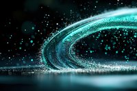 Glowing turquoise particles form dynamic curved trails against dark background, creating magical light effect with sparkles and reflections on water surface.