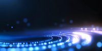 Abstract curved lines of glowing blue and white light with bokeh effects against dark background create futuristic technology concept for digital communications.