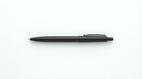 Black ballpoint pen with retractable mechanism isolated on white background, ready for design mockups, stationery graphics, and office supply presentations.