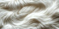 Luxurious white fur texture with flowing wavy pattern creates soft, elegant background for fashion, beauty, and luxury product designs.