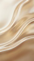 Luxurious golden silk fabric with flowing waves and soft curves creating elegant abstract texture for premium design projects and sophisticated backgrounds.