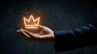 Businessman hand holding glowing neon crown symbol against dark background, representing leadership, success, achievement, and premium quality for business concepts.
