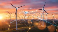 Wind turbines generating renewable energy at sunset with dramatic sky and lens flares creating sustainable power landscape for environmental technology concepts.