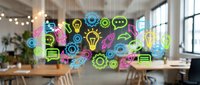 Neon glowing icons floating in modern office workspace representing innovation, technology, communication, and creative business solutions for corporate environments.