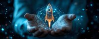 Magical glowing rocket emerging from cupped hands with sparkles and particles against dark background, symbolizing business startup and innovation concept.