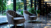 Luxurious gray velvet armchairs in modern hotel lobby with reflective marble floors, glass walls, and natural greenery views. Elegant hospitality interior design.