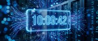 Digital clock display showing time 10:09:42 with glowing blue neon effects and data streams in futuristic server room environment for technology concepts.