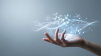 Human hand holding glowing network connections with sparkling light effects representing digital technology innovation and connectivity solutions.