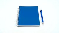 Spiral bound notebook with blue cover and matching ballpoint pen isolated on white background, ready for design mockups, stationery graphics, and office supply presentations.
