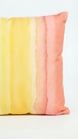 Soft fabric pillow featuring gradient color blocks transitioning from yellow to cream to coral pink, perfect for home decor and interior design projects.