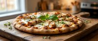 Freshly baked pizza with melted cheese, herbs, and toppings on wooden board in bright kitchen setting, ready for serving and dining.