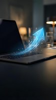 Glowing blue arrow emerging from laptop keyboard with sparkling light effects symbolizing digital growth, success and business progress in modern office.