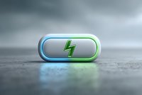 Glowing pill capsule with lightning bolt symbol on gray concrete surface, illuminated by blue and green light. Isolated medical concept for energy supplements.